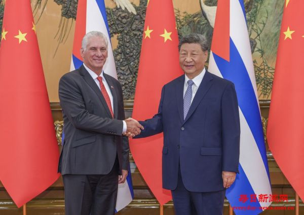习近平会见古巴共产党中央委员会第一书记、
